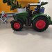 Macheta/jucarie tractor cu brat hidraulic.